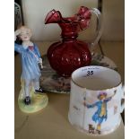 A Royal Doulton figure 'Little Boy Blue', HN2062, a Royal Doulton 'Nursery Rhymes' tankard,