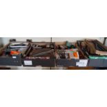 A quantity of model trains and related train set accessories, to include carriages, track,