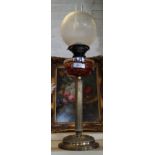 An early 20th Century oil lamp,