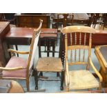 An Early 20th Century stained beech wood spindle back rocking chair,