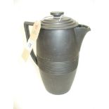 A Wedgwood Keith Murray black basalt teapot.