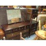 A Stag dressing table, four drawer bedside chest and a bedside cabinet (3).