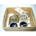 A Silver five piece cruet set comprising two salts with blue glass liners, two baluster peppers ,