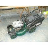 A Webb " 4 in 1 " combi petrol rotary lawn mower.