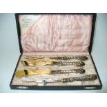 A Martin Myer cased silver cutlery set.
