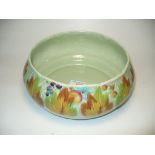 A Clarice Cliff leaf and berry fruit bowl.