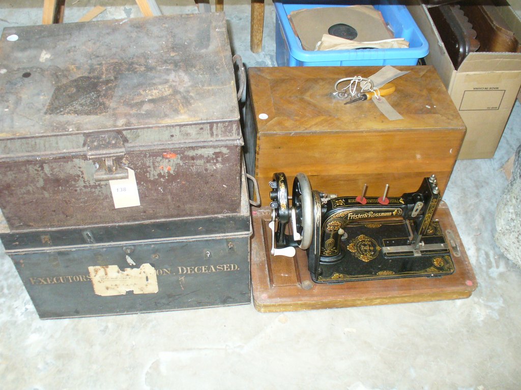 Two painted metal deed boxes and a cased Frister & Rossmann sewing machine (3).