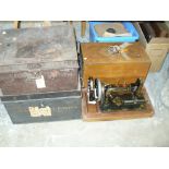 Two painted metal deed boxes and a cased Frister & Rossmann sewing machine (3).