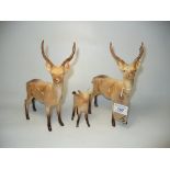 Two Beswick stag figures and a Beswick fawn (3)