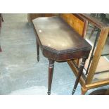 A 19th Century mahogany folding games table with canted corners.