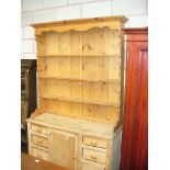 A pine high back kitchen dresser,