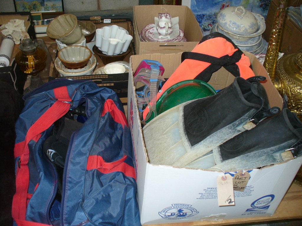 A Collection of diving equipment and effects, flippers, boxed Scubapro regulator, goggles,