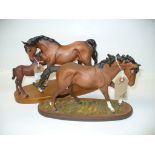 A Royal Doulton group " Spirit of affection " and a Royal Doulton matt model of a bay horse " The
