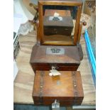 A Victorian parquetry banded stationary box, a 19th Century domed mahogany box and a toilet mirror.