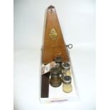 A Cased French metronome, two pairs of opera glasses and a mahogany cased jewelers scales.