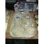 Three cut glass ships decanters, a bottle shaped decanter, mallet shaped decanter and 1 other.