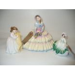 Three Royal Doulton figurines " Daydreams " Hn 1731, " Buddies" Hn 3296 and " Sunday Best" Hn 3218.