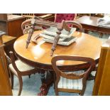 A 19th Century mahogany circular pedestal centre table and a set of six Victorian mahogany balloon