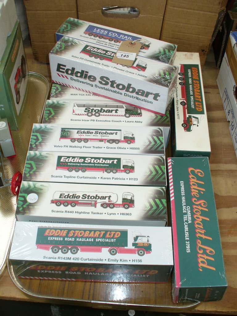 Twelve boxed as new Atlas Editions Eddie Stobart die cast model lorries including Scania R143M 420