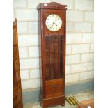 A 1930's Walnut cased longcase clock with a silvered dial signed DUFA with three brass cased