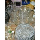 Cut glass fruit bowls, a footed fruit bowl, a cut glass trumpet shaped vase other cut glass items.