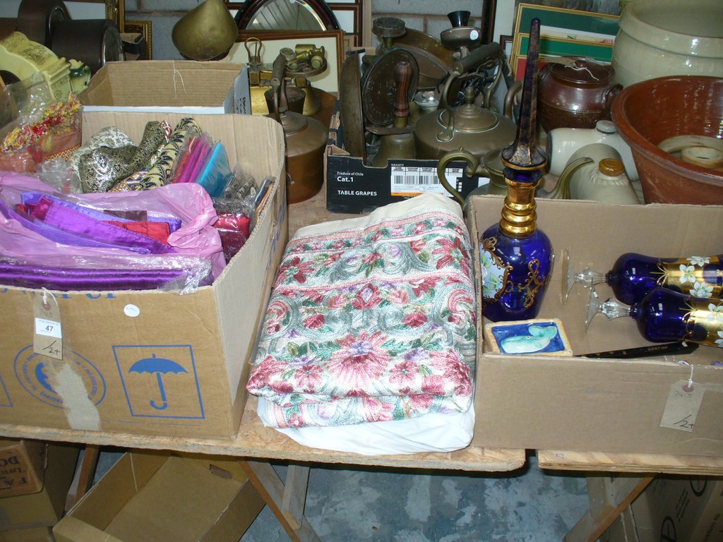 A Large collection of new silk throws, bed sheets, cushion covers, curtains, etc,