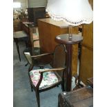 A 19th Century style mahogany pedestal table, a fluted column lamp standard,