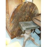 An Early 19th Century rosewood pedestal circular centre table on four down swept supports.