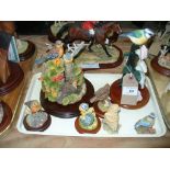 A Collection of Border Fine Art bird figures including a blue tit on sweet pea, " After the rain " ,