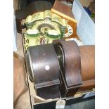 A Collection of clocks including oak cased mantel clocks, ceramic clock garniture,