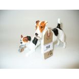 A Royal Doulton model of a tri coloured terrier with a slipper and a second model of a tri coloured