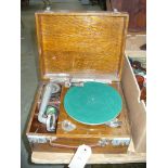 An Early 20th Century oak cased " Dorian " portable gramophone.