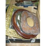 A Carved Japanese hardwood oval wall mirror,