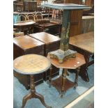 A 19th Century painted and gilt embellished pedestal table and a Victorian inlaid octagonal table