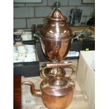 A 19th Century copper samovar with a turned ebonised finial and handles and a Victorian copper