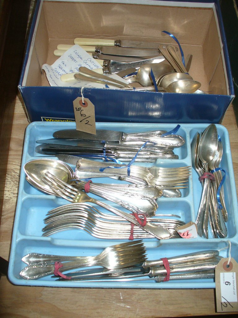 A quantity of various German silver plated cutlery comprising eight dessert spoons,