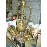 A Large Eastern brass ewer , an ornate open work hanging brass lantern, brass pestles and mortars,