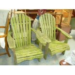 A Pair of Adirondack slatted garden chairs.