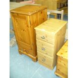 A Modern pine side cabinet and a pine effect bedside chest.