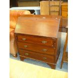 An Edwardian inlaid mahogany bureau with a fall front above three long drawers.