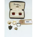 An 18ct Gold wedding band, a 9ct gold signet ring , a white metal band, cuff links, etc.