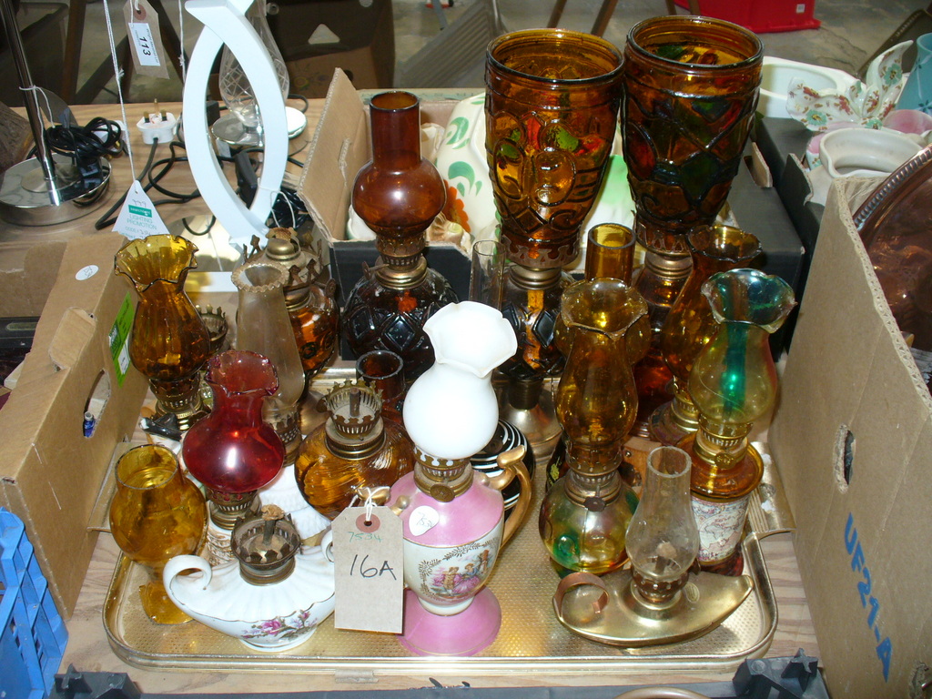 A Collection of Victorian amber glass and other assorted oil lamps to a tray ( approx.