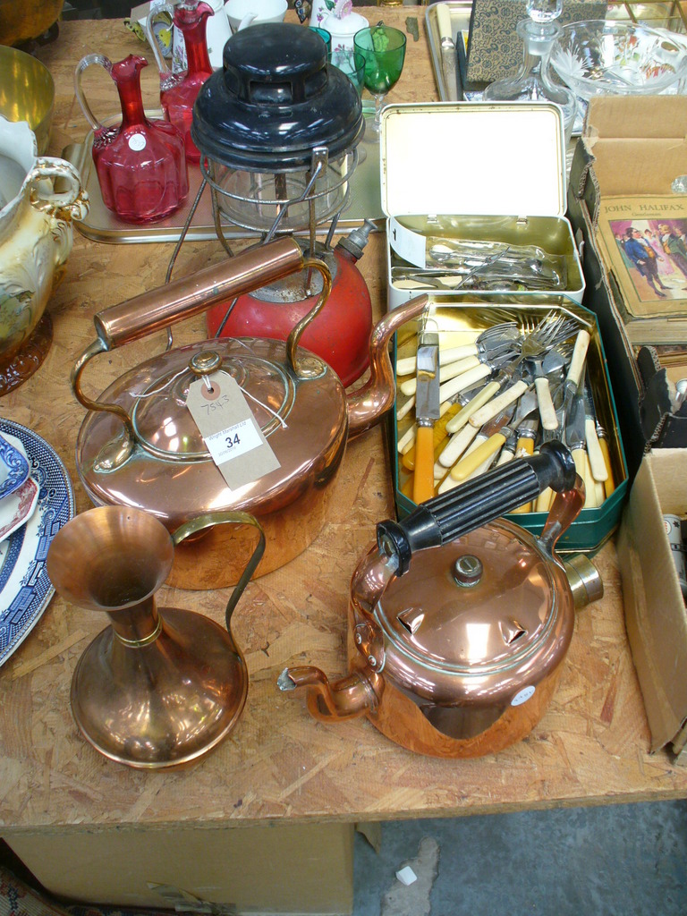 A Victorian copper kettle, an early electric copper kettle, loose cutlery, lamp, etc.