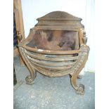 A Cast iron regency style fire basket.