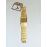 Accurist: A gold tone calendar bracelet strap wristwatch,