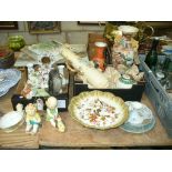 A Collection of decorative ceramics including a mantel clock, candlesticks,