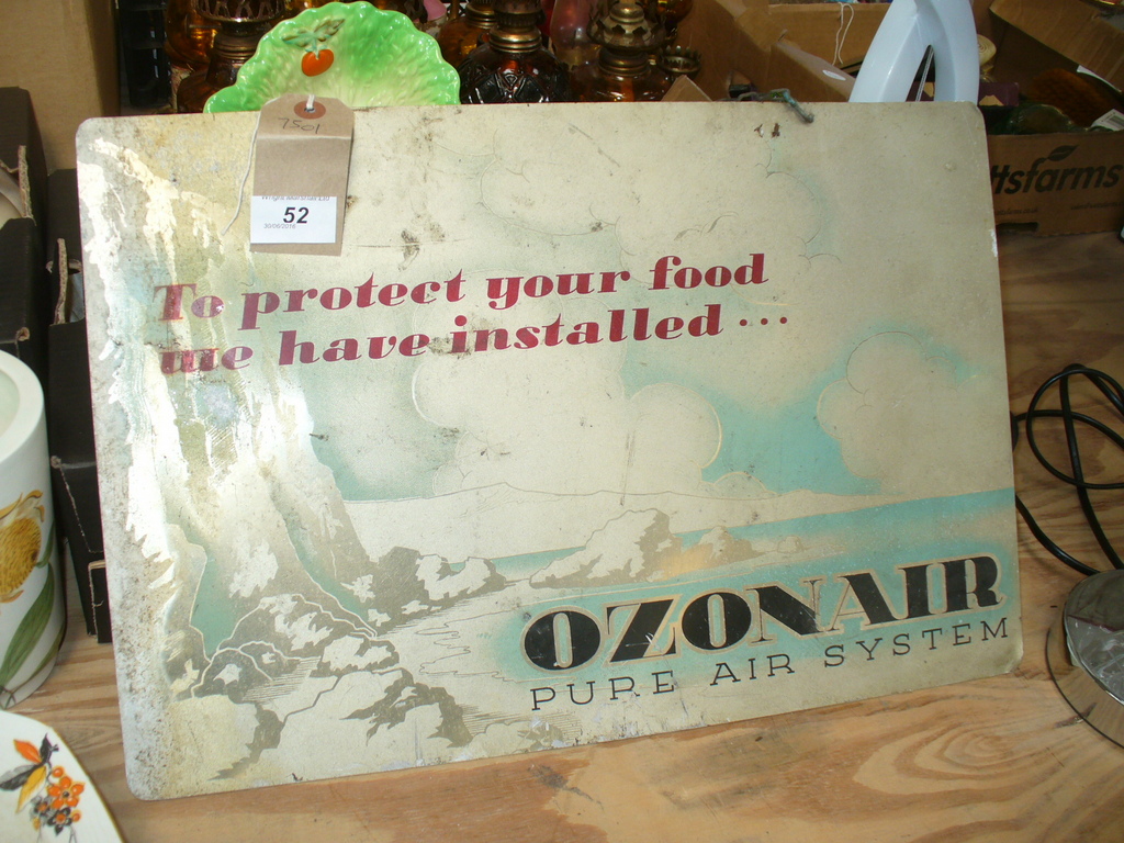 A Vintage " Ozone Air pure air system " two sided hanging metal sign.