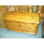 A Modern pine blanket chest.