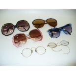 2 Pairs of vintage wire work spectacles and 4 pairs of sunglasses.