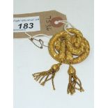 A Victorian gold coloured rope effect brooch with twin tassels.